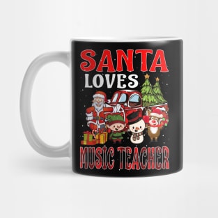 Santa Loves Music Teacher Mug